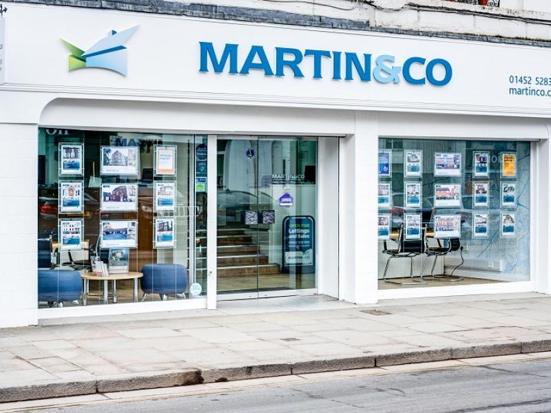 An exterior view of the Martin & Co estate agent office in Gloucester