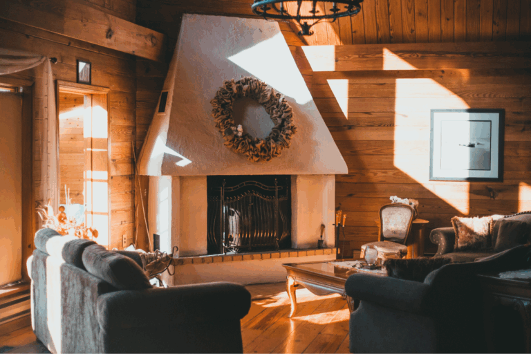 Inviting living room with autumn sunlight and fireplace, showing how to present your Huddersfield home for sale this autumn