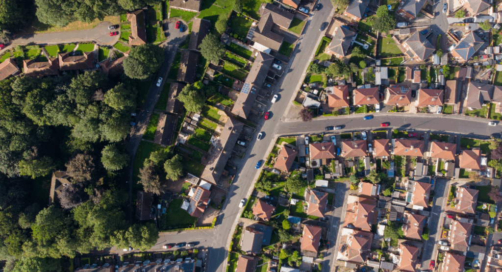 Aerial view of a residential area in Worksop, featuring rows of homes and tree-lined streets, representing the local rental property market.