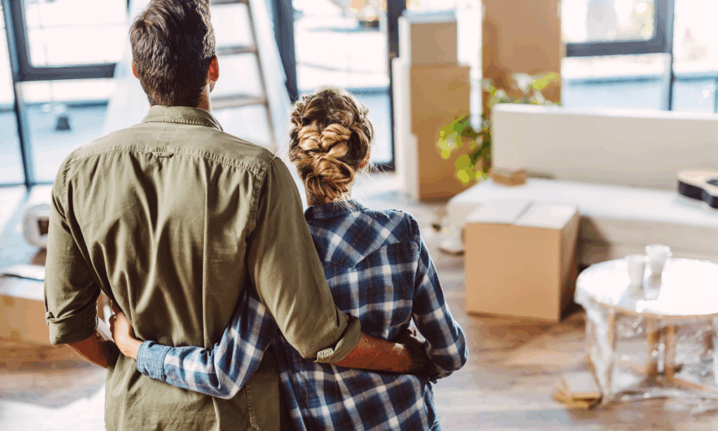 Couple reviewing their rental property while considering professional management in Reading