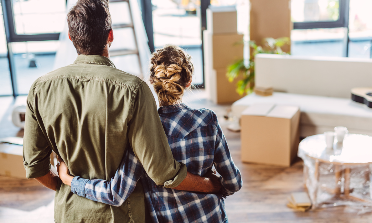 Couple reviewing their rental property while considering professional management in Reading
