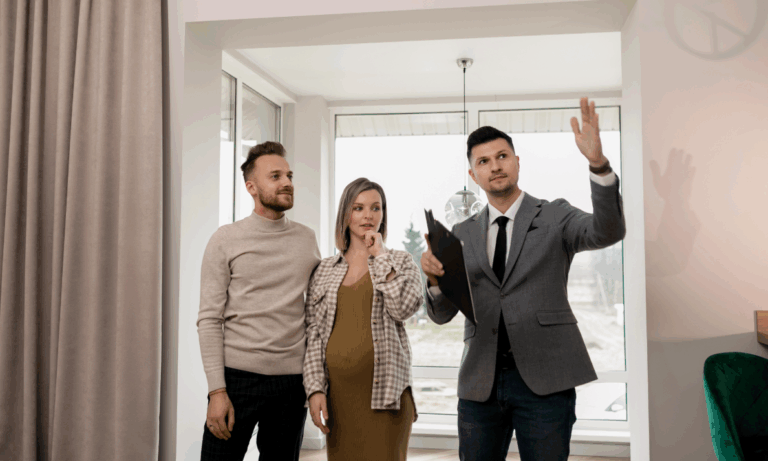 Estate agent discussing a home sale with sellers in Oxford’s competitive 2026 property market