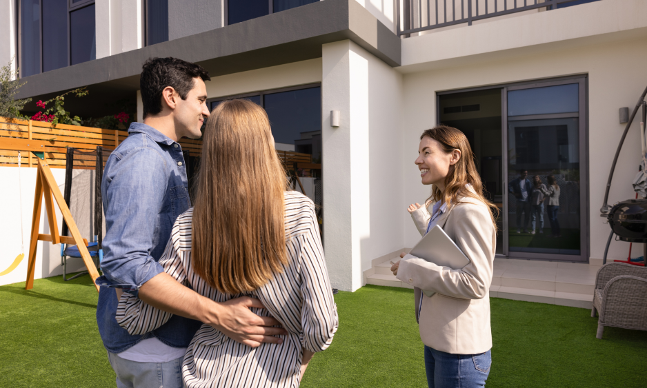 Letting agent showing a modern new-build rental home to tenants in Lunts Heath Widnes