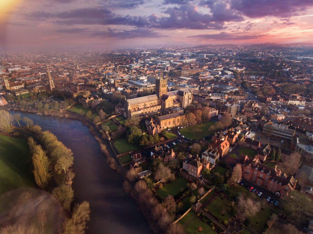 Aerial view of Worcester city centre and cathedral beside the River Severn, highlighting the growing property market in Worcester.