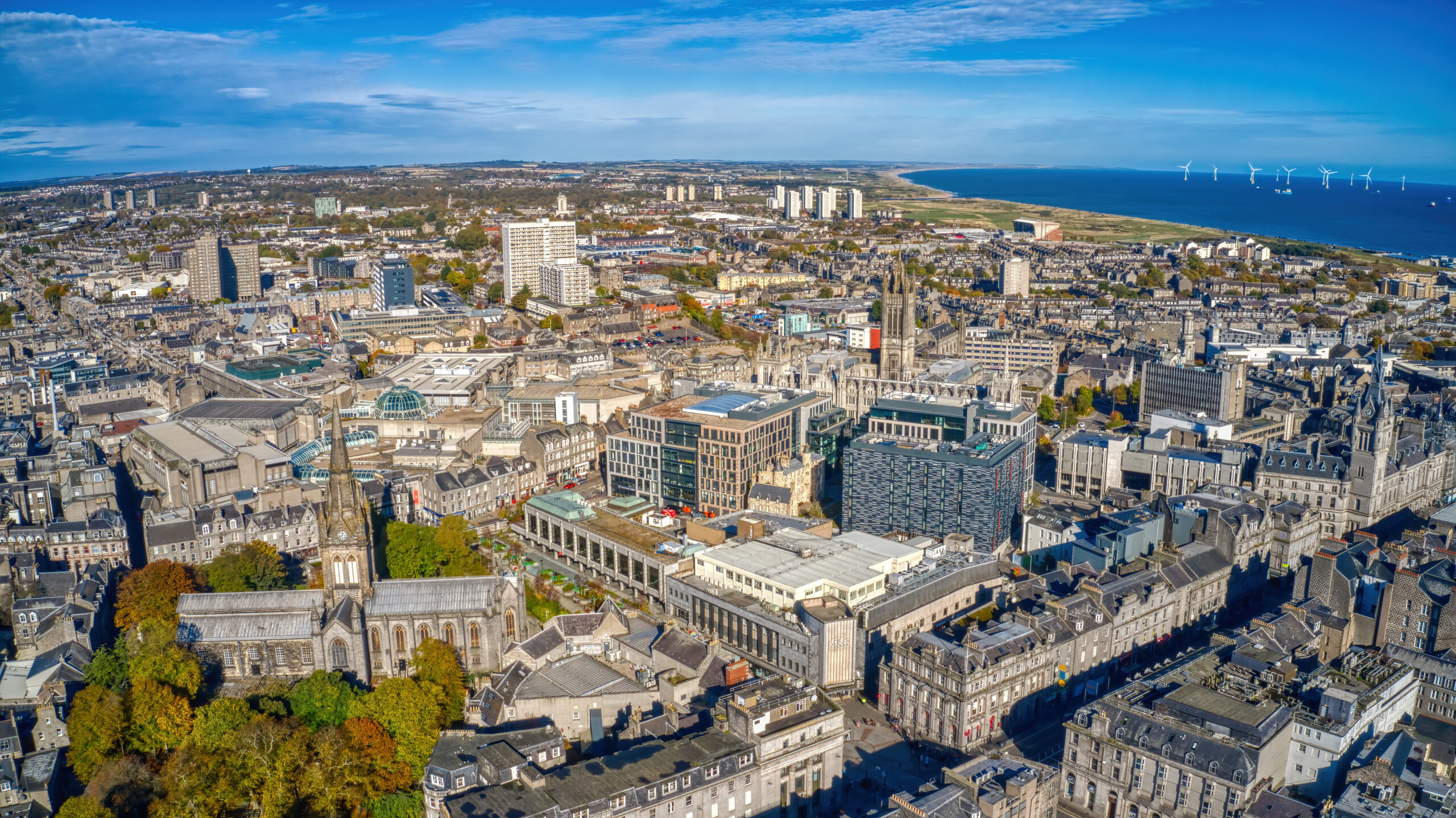 Aerial view of Rosemount Aberdeen showing city centre buildings and coastal skyline