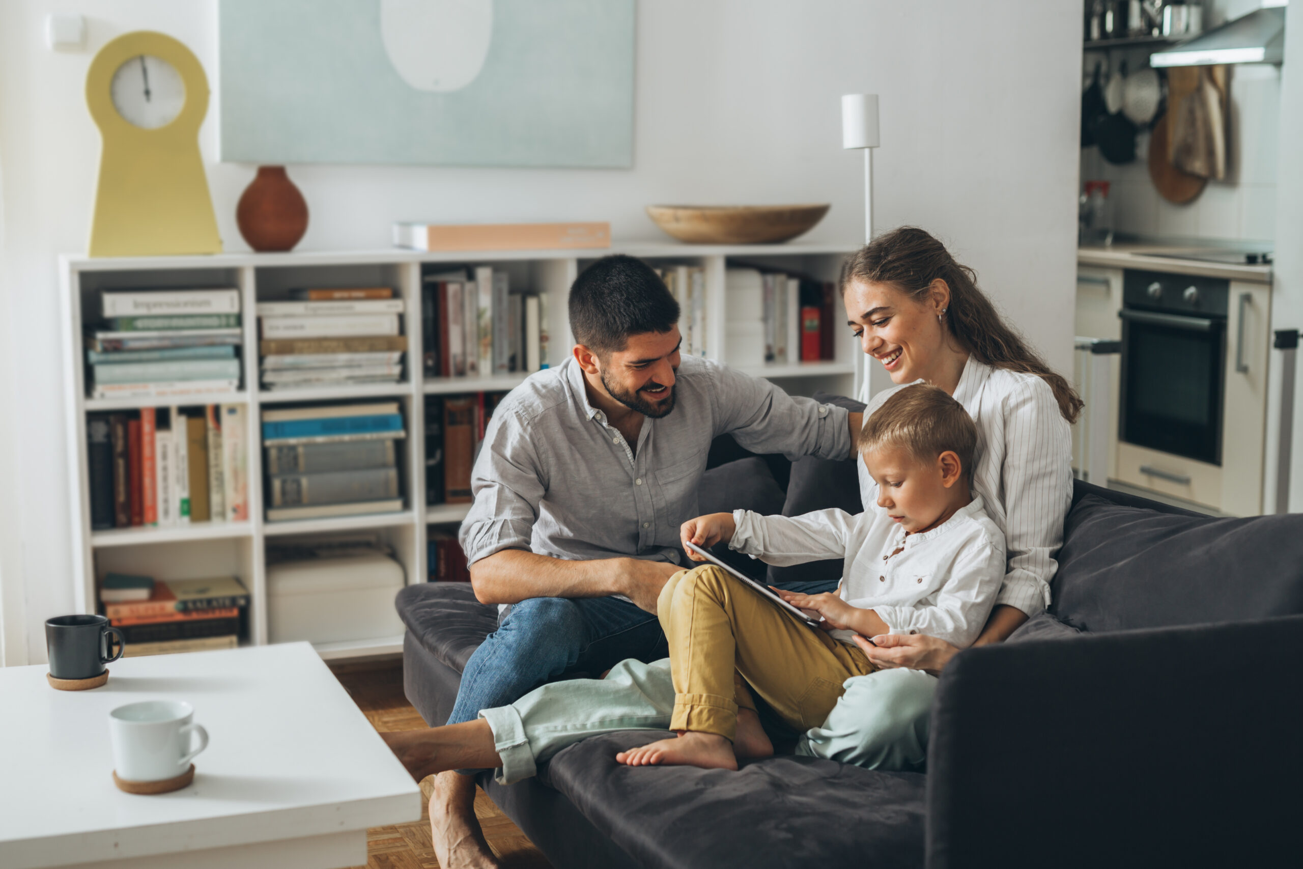 family relaxing together in living room in Milverton CV32 Leamington Spa