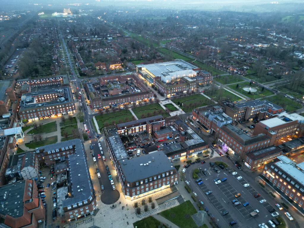 Aerial view of Welwyn Garden City showing town centre, residential areas, and regeneration developments