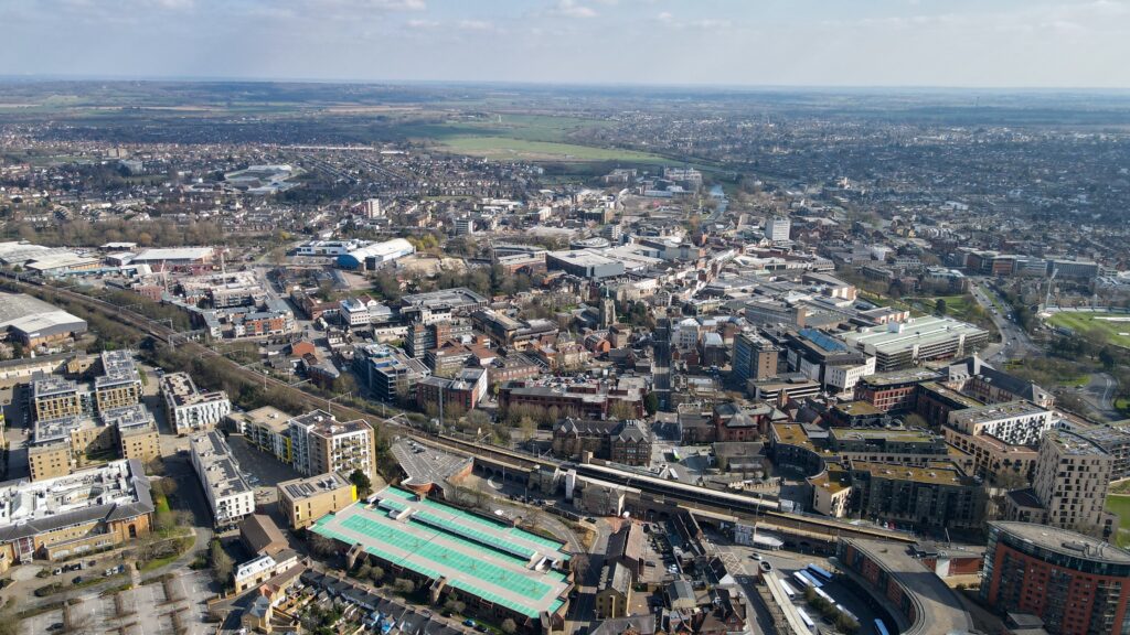 Aerial view of Chelmsford showing residential neighbourhoods, transport links, and city centre property developments