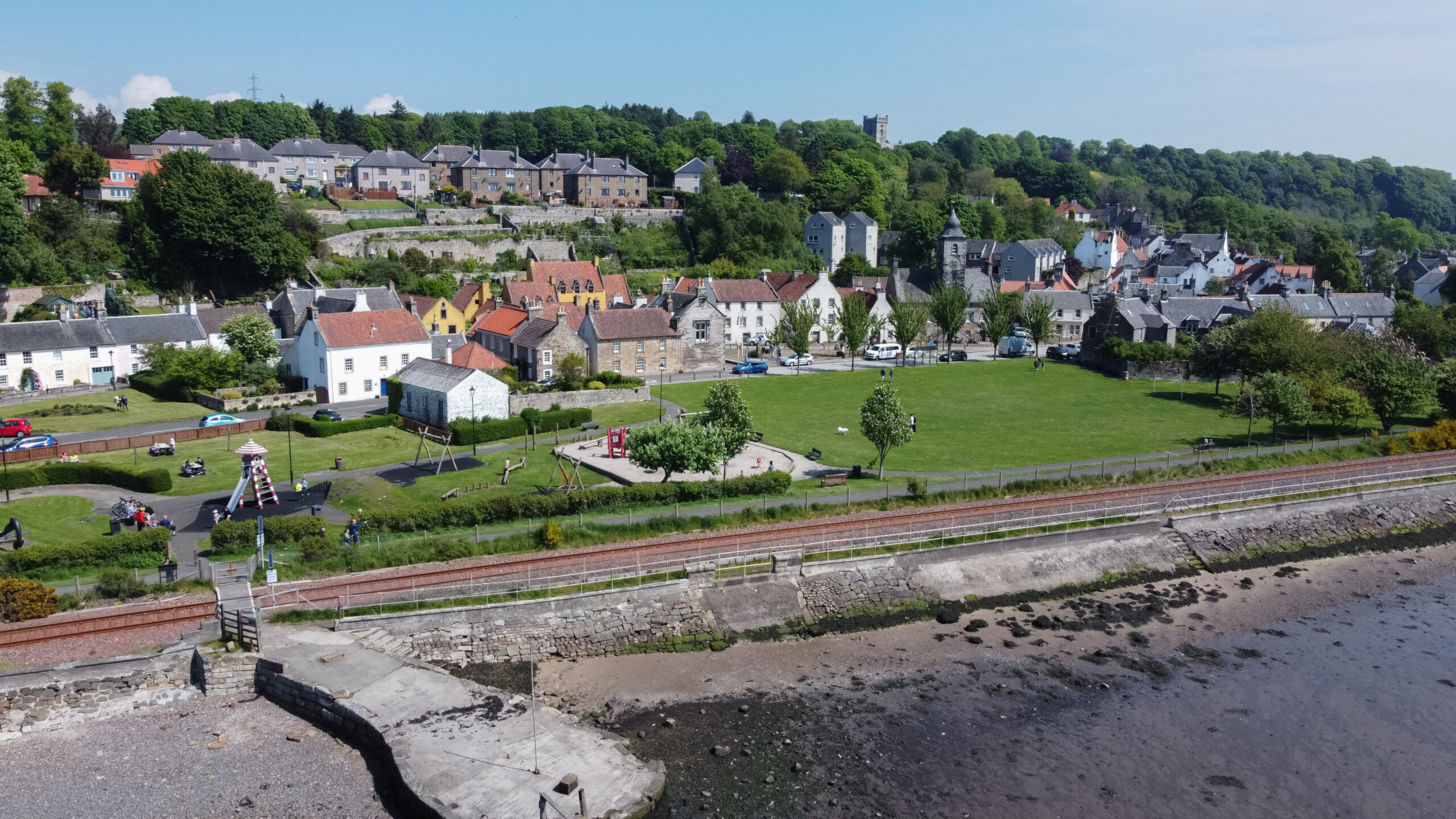 Aerial view of residential homes and green spaces in Dunfermline, Scotland