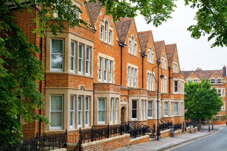 Traditional brick residential homes on a quiet street in Oxford, England