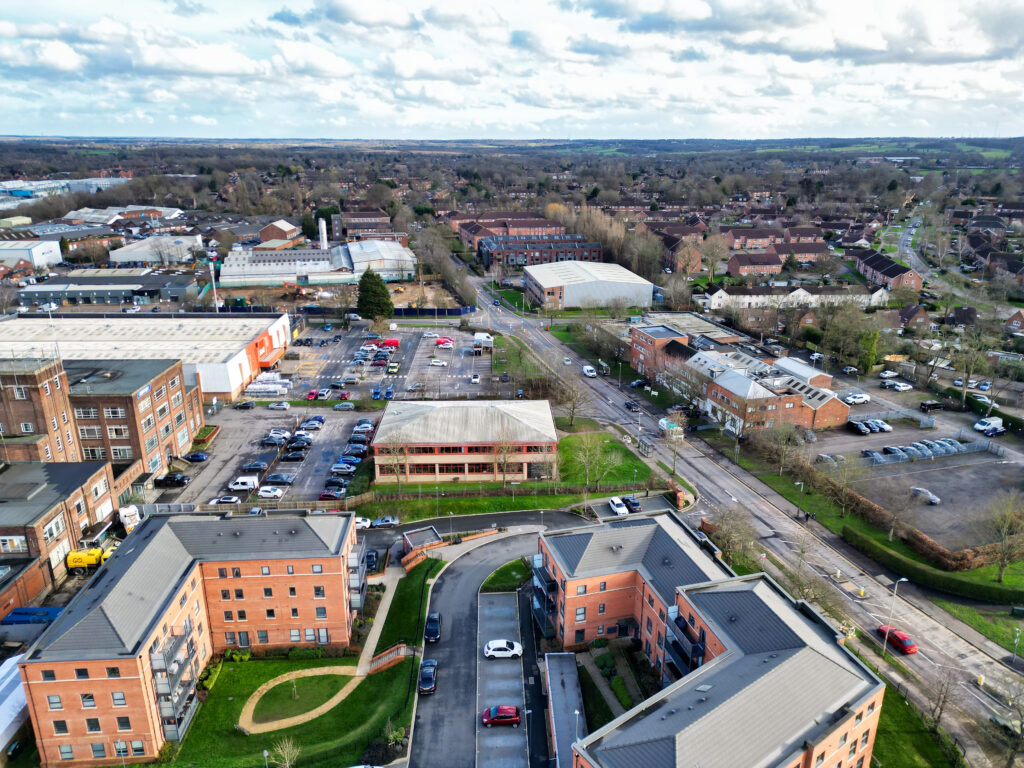 Aerial view of residential and commercial areas in Welwyn Garden City showing popular rental investment locations.