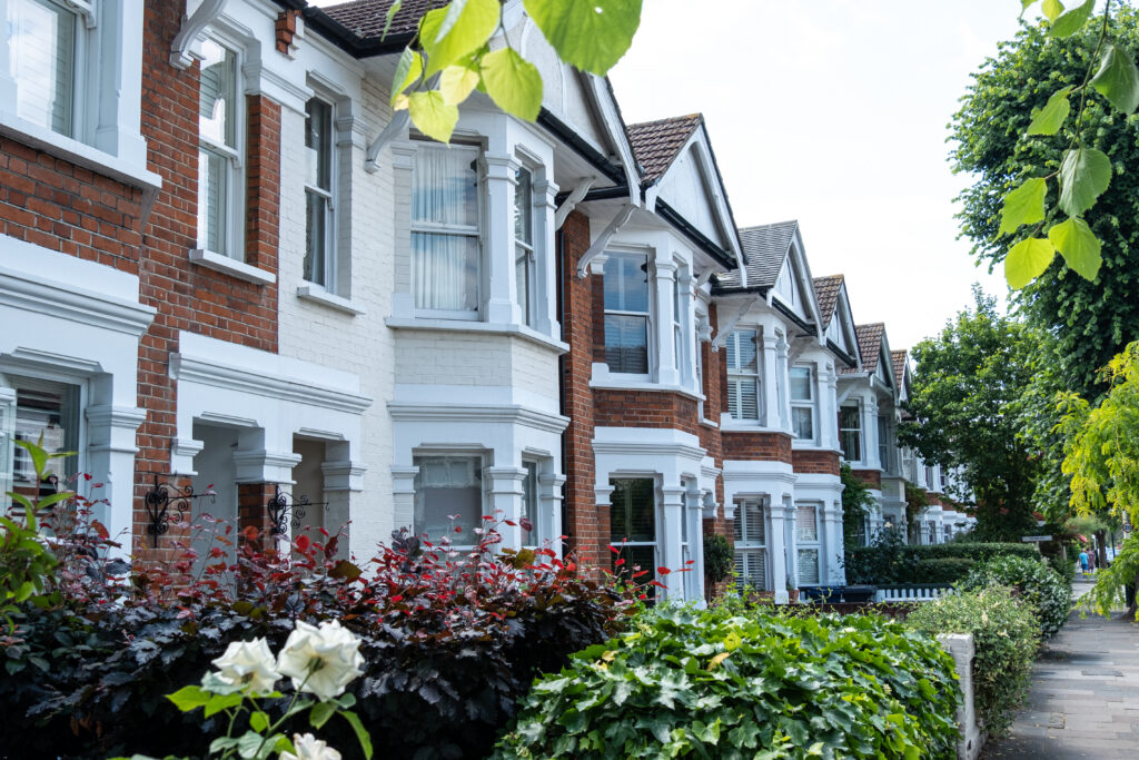 Tree-lined street of period homes, representing Solihull property values and local housing demand in 2026.