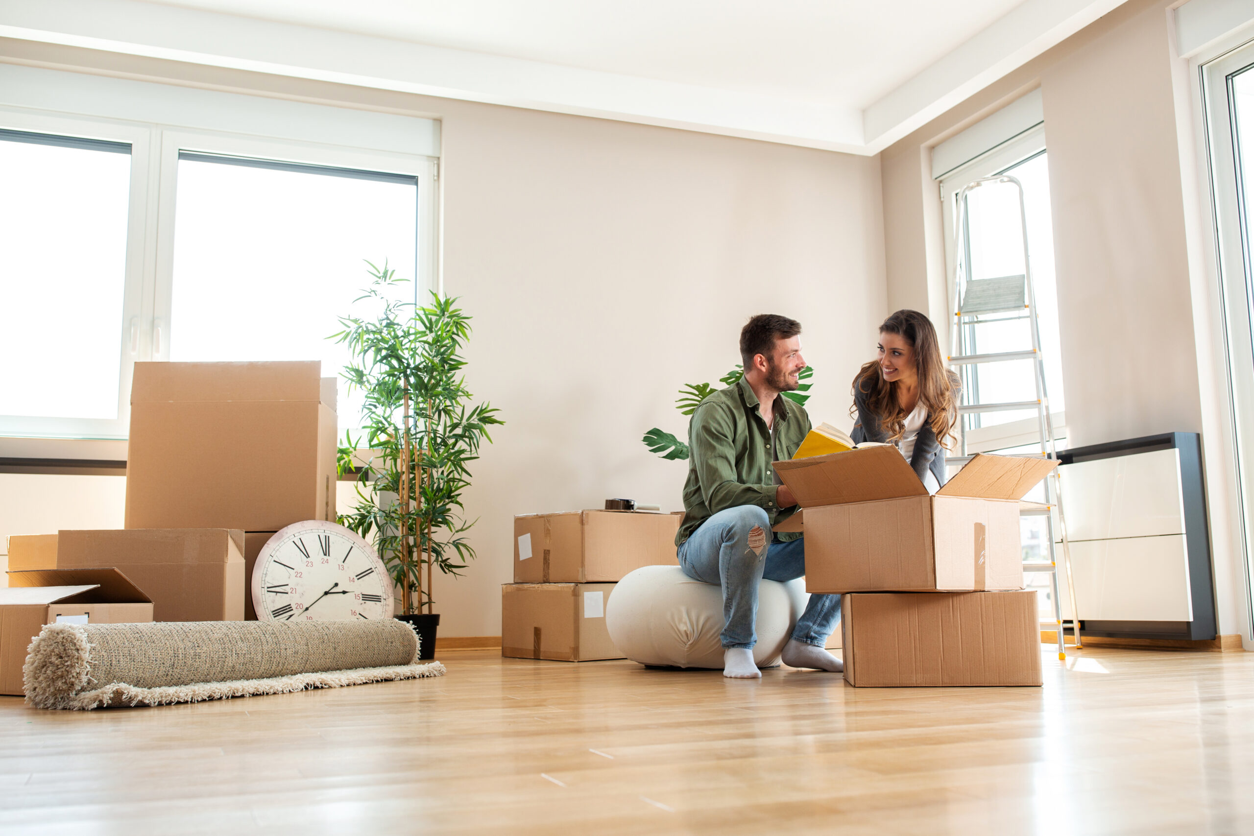 Couple unpacking boxes in a bright rental property, reflecting tenancy changes, tenant security and landlord compliance under the Renters’ Rights Act in Chelmsford.