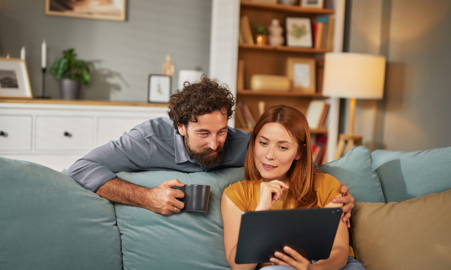Couple researching rental property and buy-to-let opportunities in Newbridge, Bath.