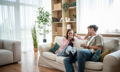 Young couple relaxing together in a bright rented home in Acocks Green or Olton