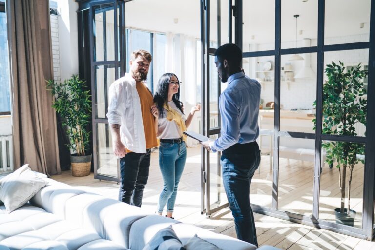 Estate agent showing a family around a home in Galleywood, Chelmsford