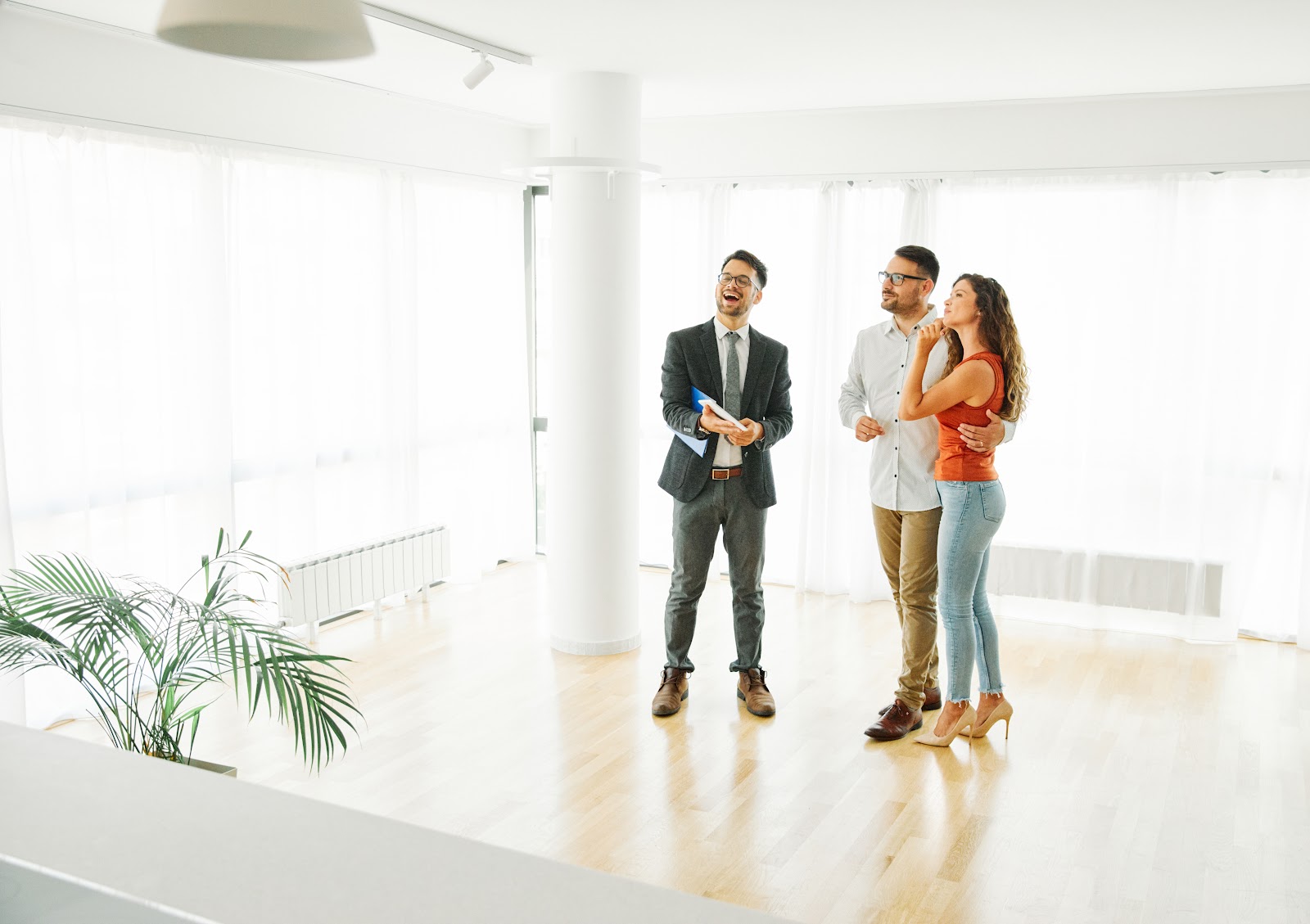 Estate agent showing buyers a home in Stoke-on-Trent